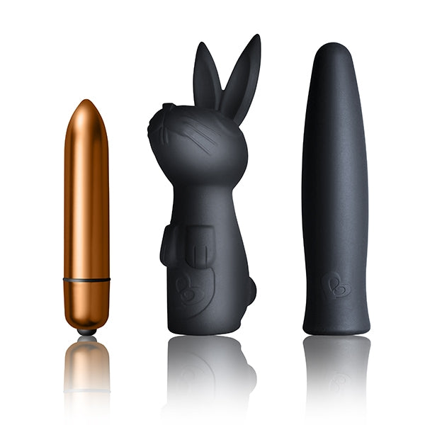 Three different designs of a black rabbit-shaped vibrators for couples and solo pleasure on a white background